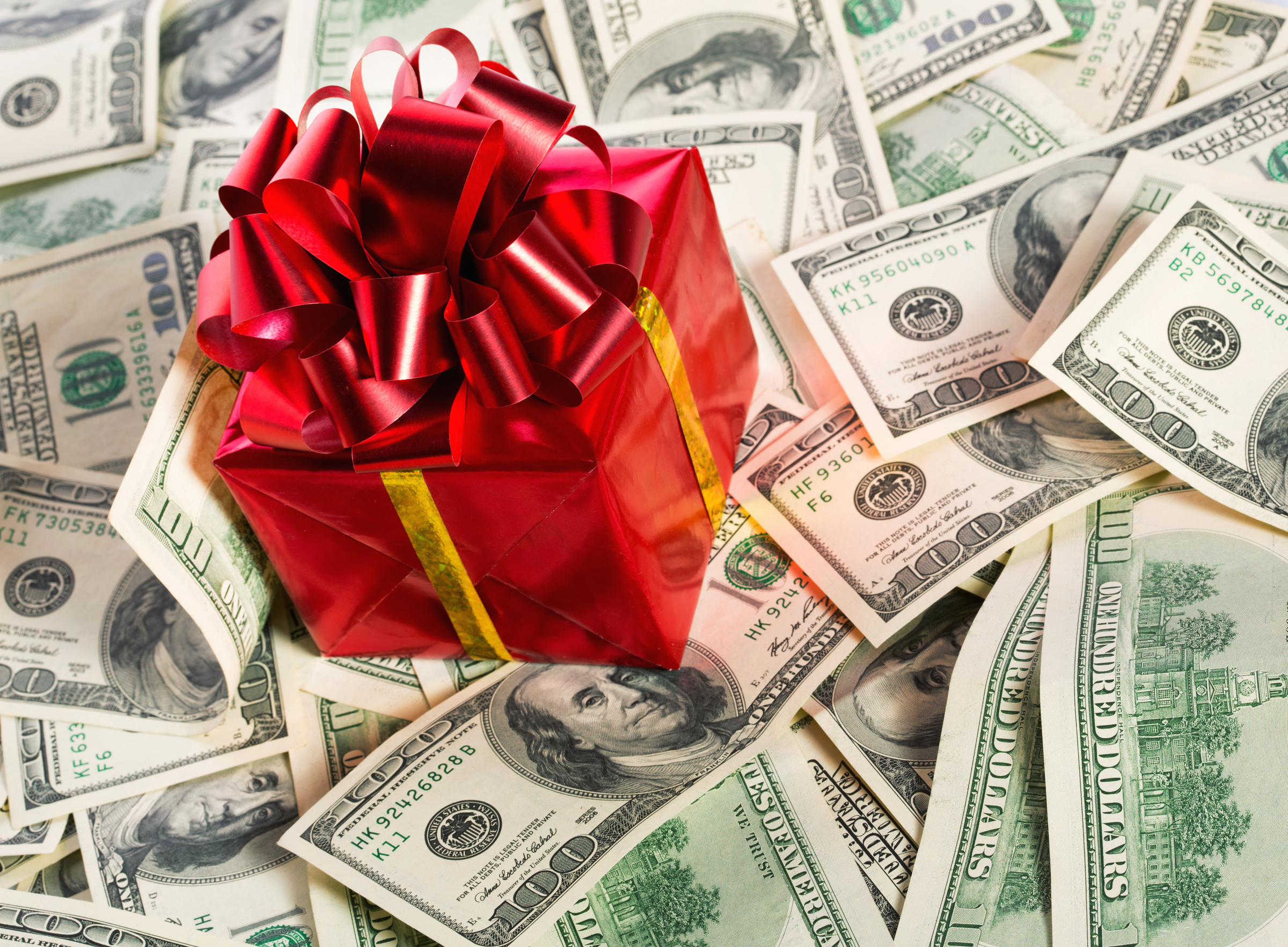 Christmas cash money holiday bonuses article